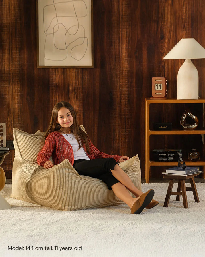 Wigiwama Brown Sugar Club Chair in a cosy home interior