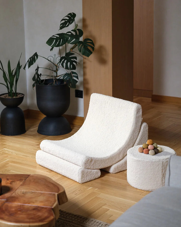 Wigiwama Cream White Moon Chair in a cosy home interior