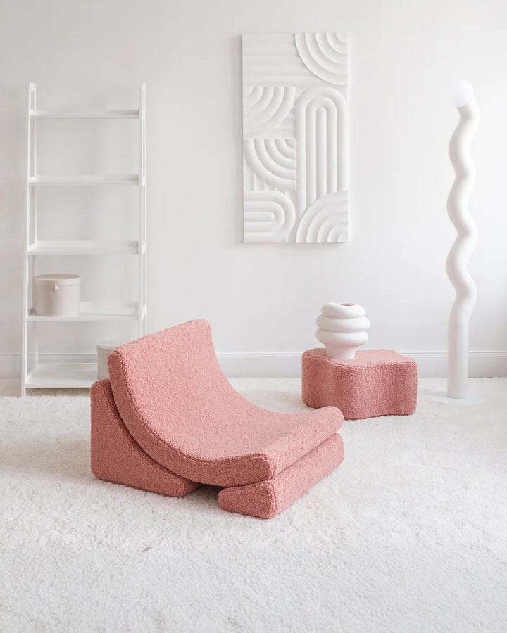 Wigiwama Guava Moon Chair in a cosy home interior
