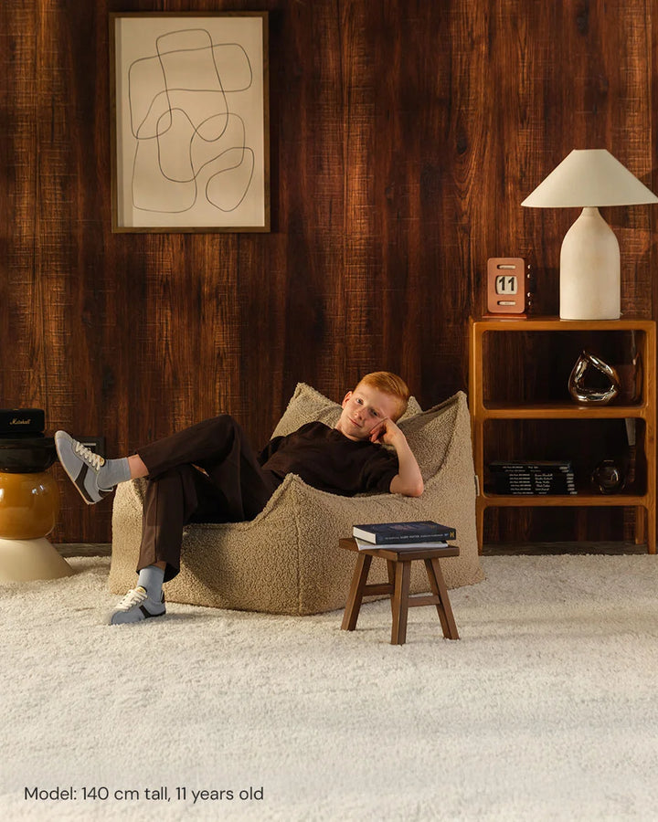Wigiwama Biscuit Club Chair in a cosy home interior