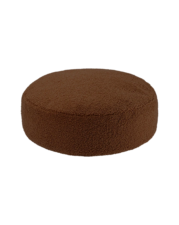 Wigiwama Warm Hazel Ottoman in a cosy home interior